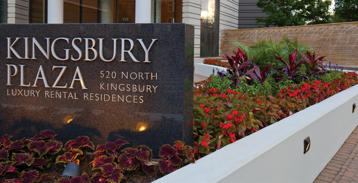 Signage at the front exterior that reads Kingsbury Plaza